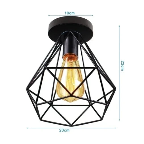 Black geometric metal cage ceiling light with vintage Edison bulb, 22cm height and 20cm width, ideal for modern industrial interiors.







