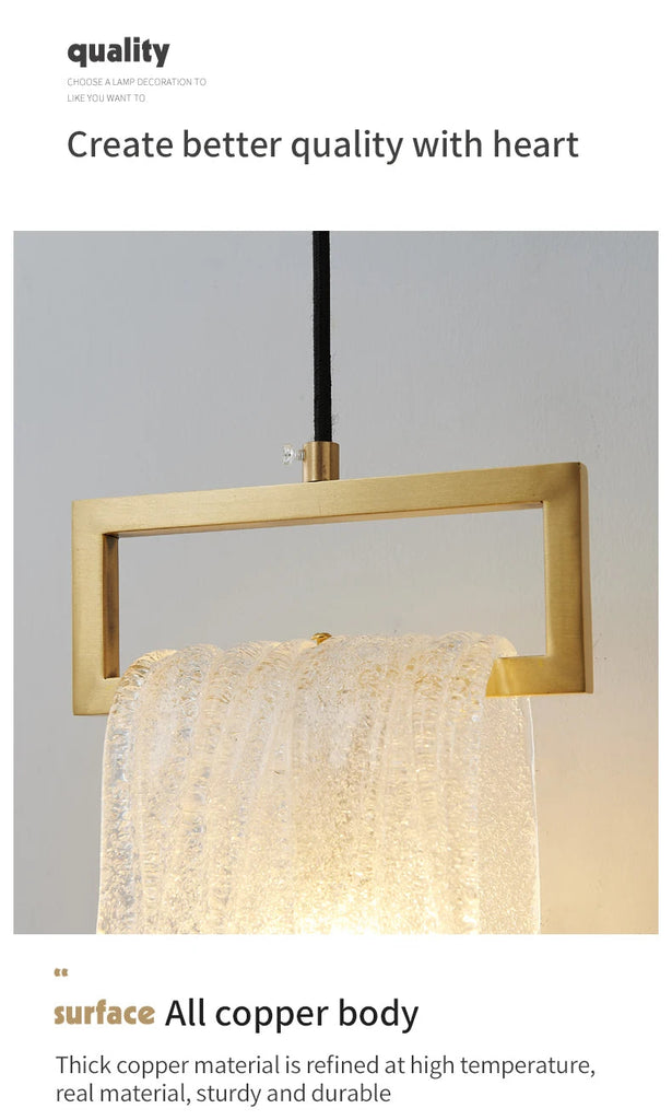 close-up of vintage crystal bathroom wall sconce with gold finish