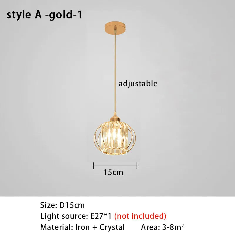 A chic gold pendant light suspended above a table, creating a warm and inviting ambiance in the stylish interior.