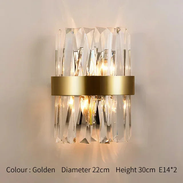 Gold wall sconce with faceted crystal glass rods and central gold band, 30cm height and 22cm diameter. E14*2 bulb design adds elegance to hallways, bedrooms, or luxury living spaces.