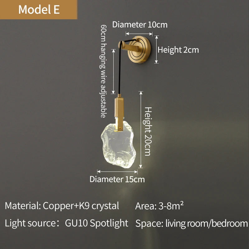 model e bathroom wall sconce with organic-shaped crystal pendant