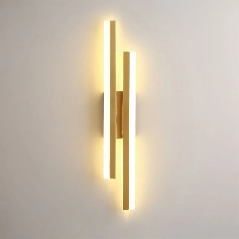 Modern wooden wall light featuring three individual lights, perfect for adding style and warmth to any room.