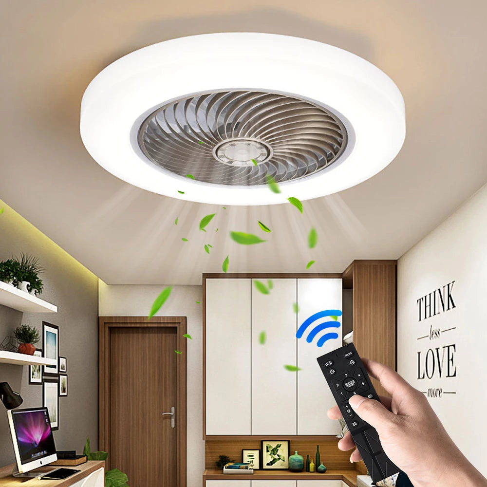 Modern ceiling fan with integrated LED light and wireless remote control, installed in a stylish home office. The fan is shown circulating air with green leaves to illustrate airflow.