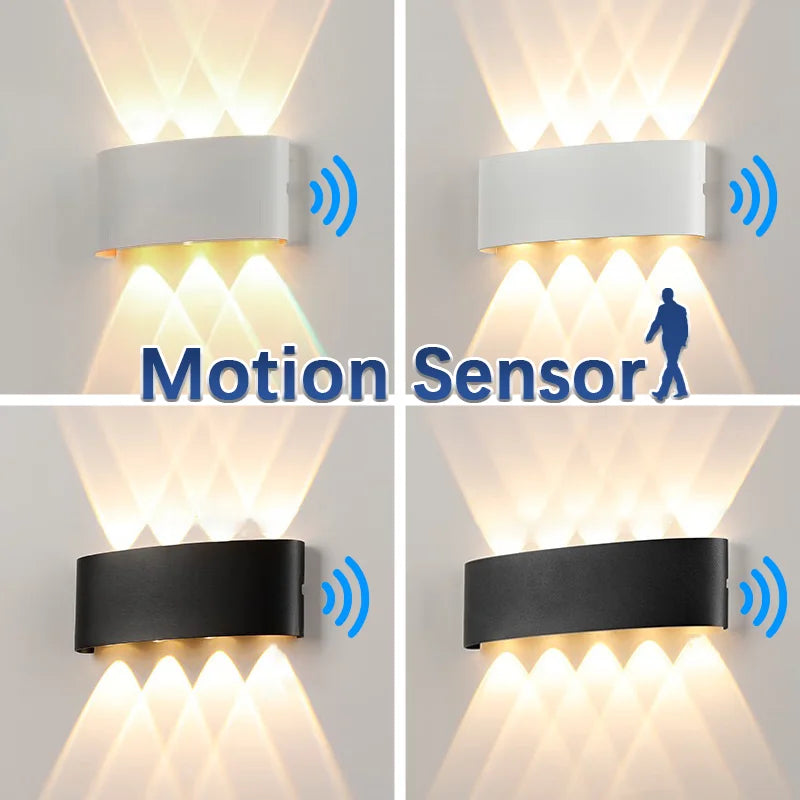 Four modern wall lights, two white and two black, emit patterned beams of light; motion sensor icons are shown, with text reading "Motion Sensor" and a walking figure on the image.