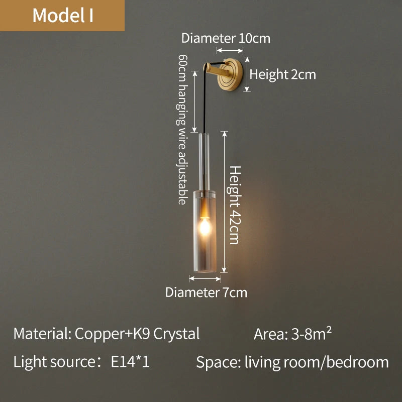single brass and crystal rod bathroom wall sconce with upward light