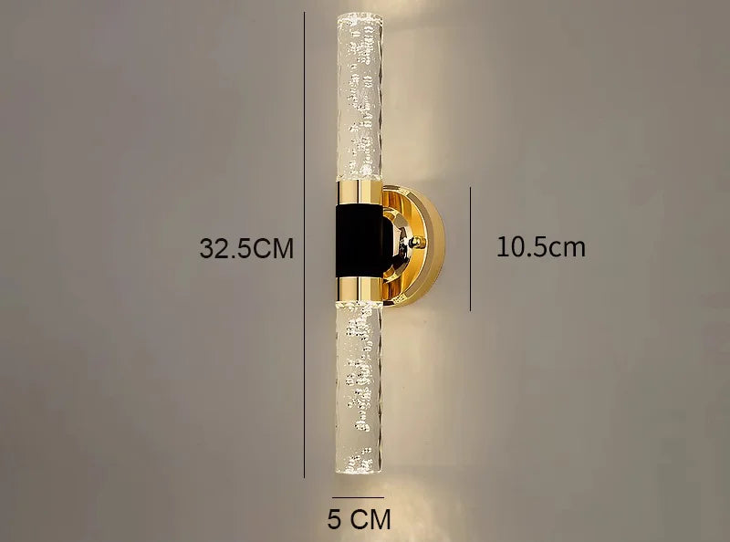 Tall vertical bathroom wall sconce light measuring 32.5cm with bubble acrylic and gold accents.