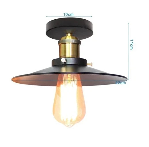 Vintage industrial ceiling light fixture with black metal shade, brass fittings, and Edison bulb, measuring 10cm width and 11cm height